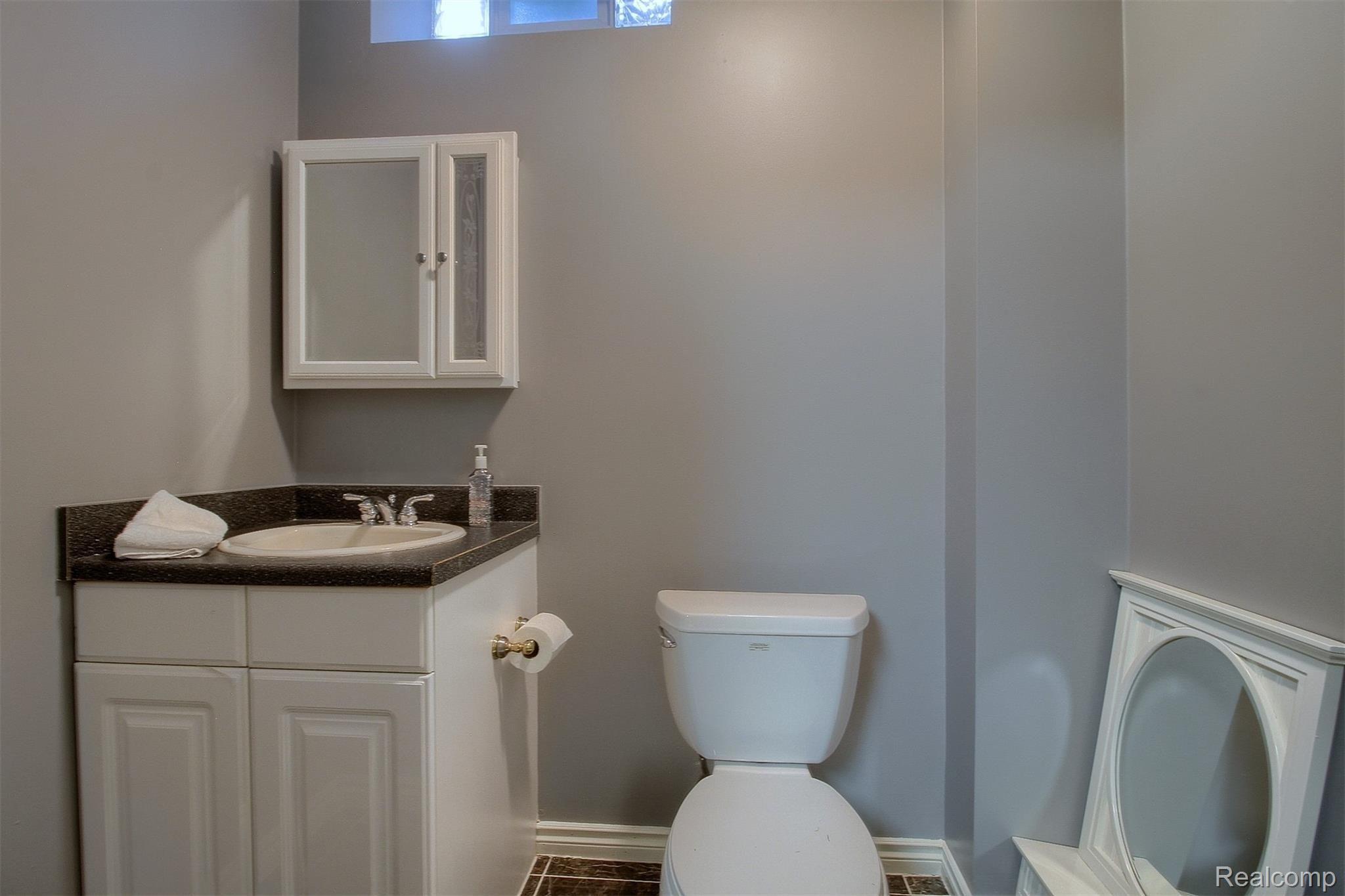 4446 Southacre Lane Rochester, MI 48306 - Photo 51 of 70 51-Finished Lower Level Half Bath.jpg