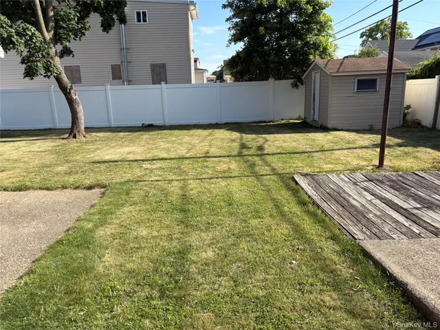 a view of a terrace with a table and chair
