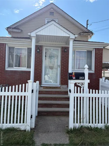 a front view of a house with a porch