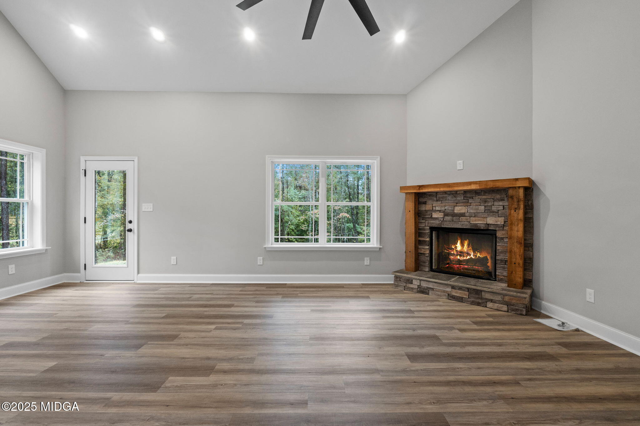 2760 Boxankle Road Forsyth, GA 31029 - Photo 15 of 50 a view of an empty room with window and fire place