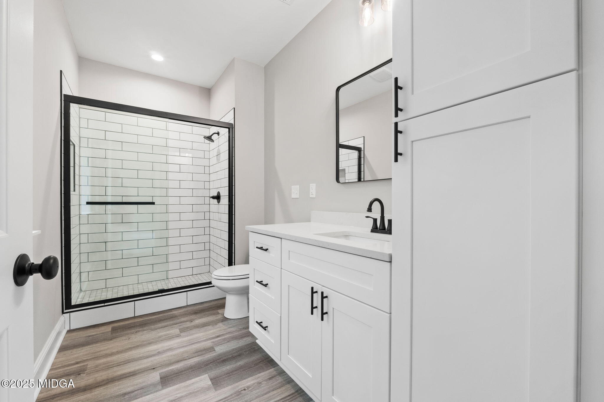 2760 Boxankle Road Forsyth, GA 31029 - Photo 21 of 50 a bathroom with a sink a toilet and shower