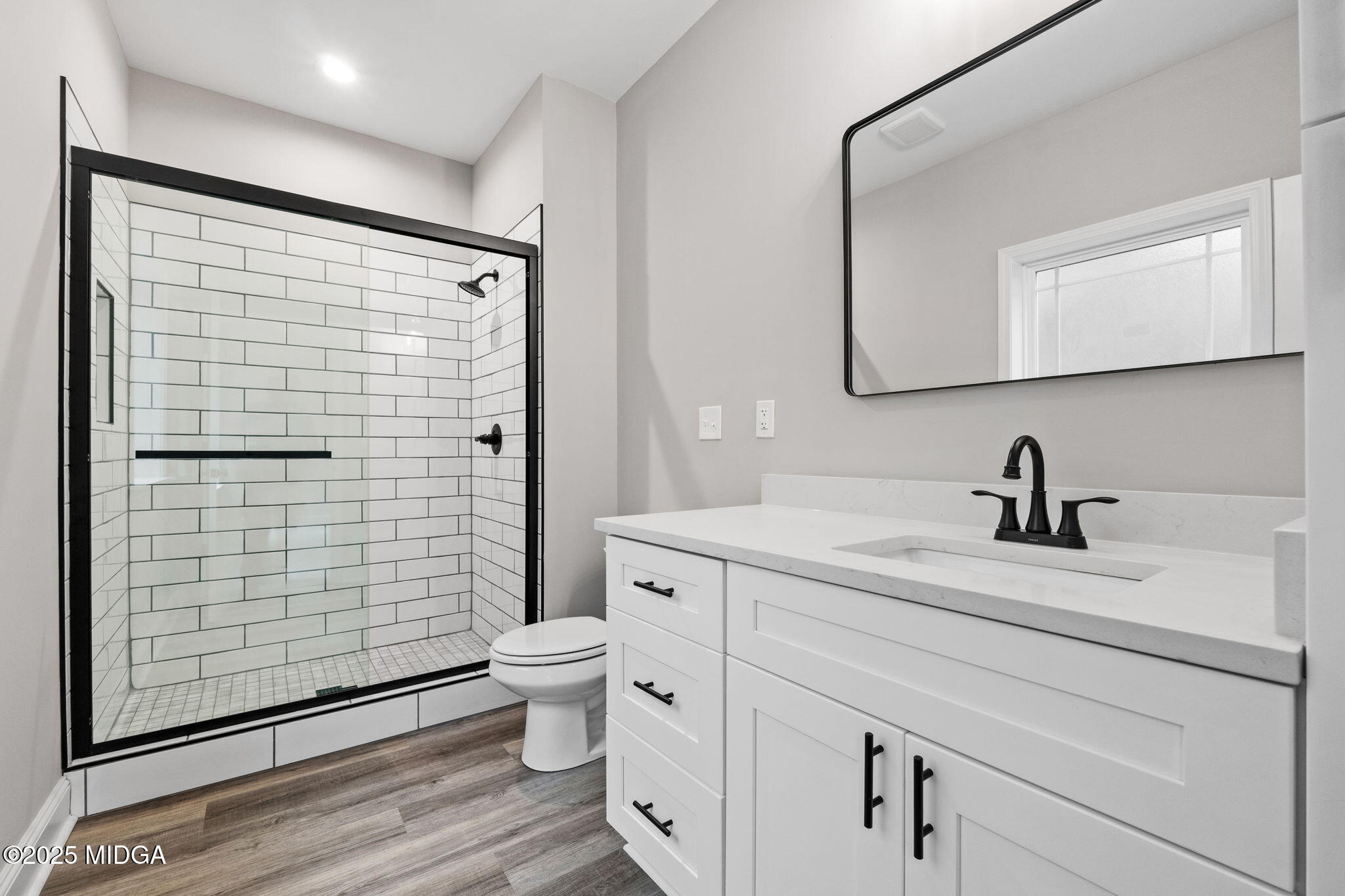 2760 Boxankle Road Forsyth, GA 31029 - Photo 22 of 50 a view of bathroom with a toilet sink and a shower