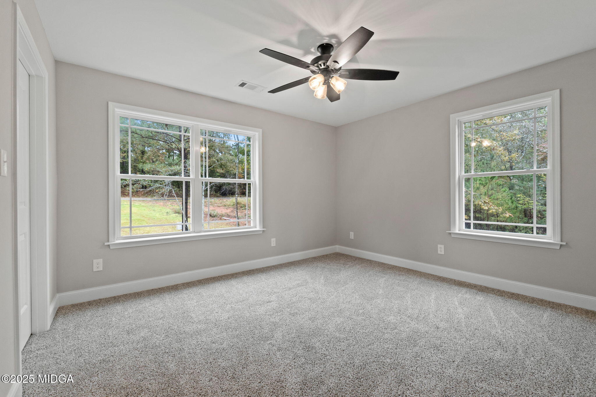 2760 Boxankle Road Forsyth, GA 31029 - Photo 34 of 50 a view of an empty room with a window