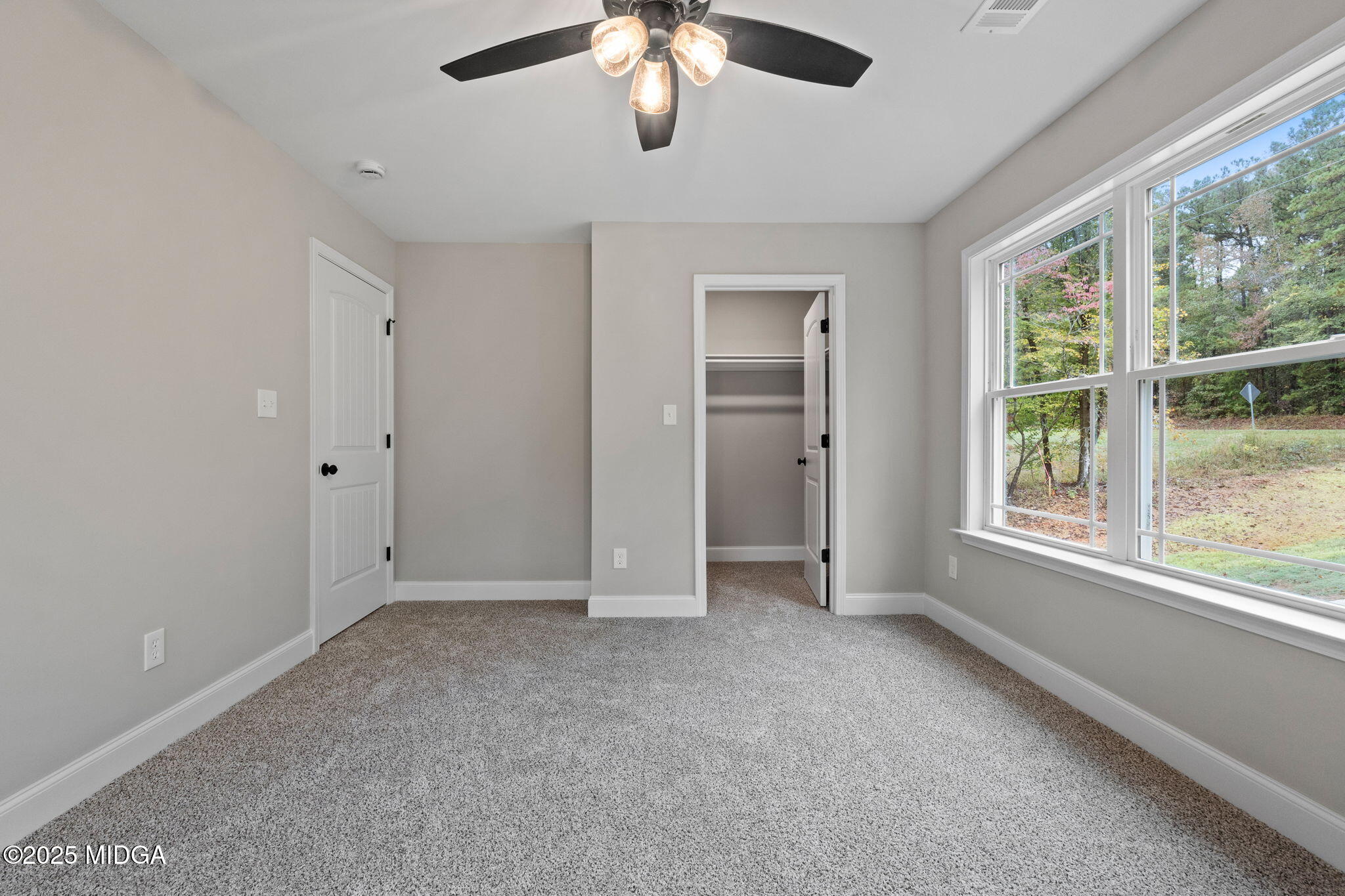 2760 Boxankle Road Forsyth, GA 31029 - Photo 35 of 50 a view of an empty room with a window