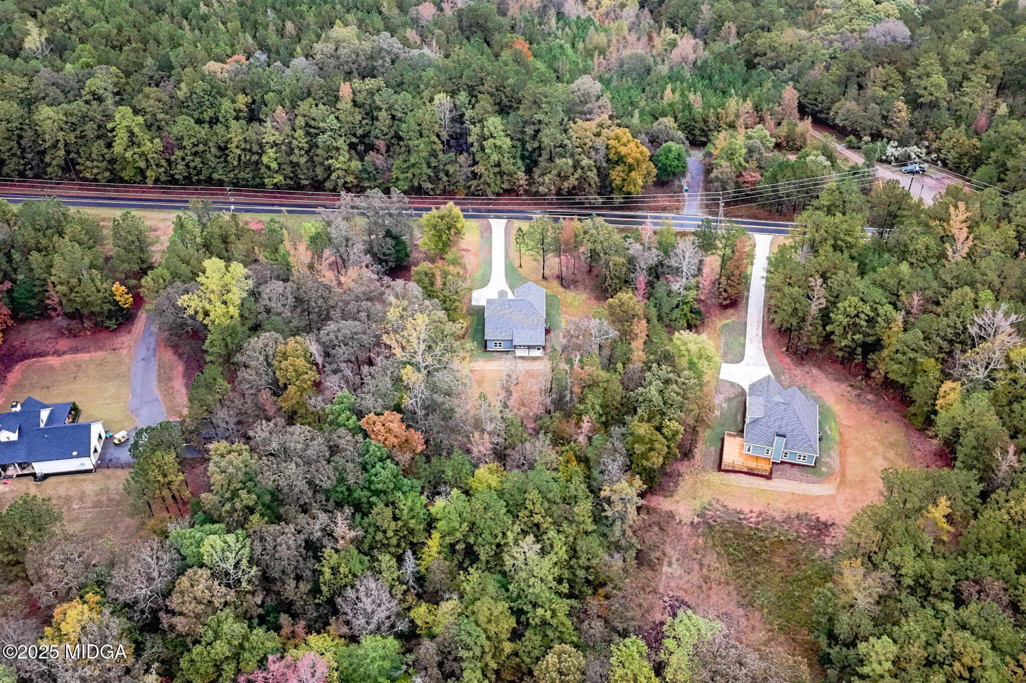 2760 Boxankle Road Forsyth, GA 31029 - Photo 47 of 50 an aerial view of a house with a garden and lake view