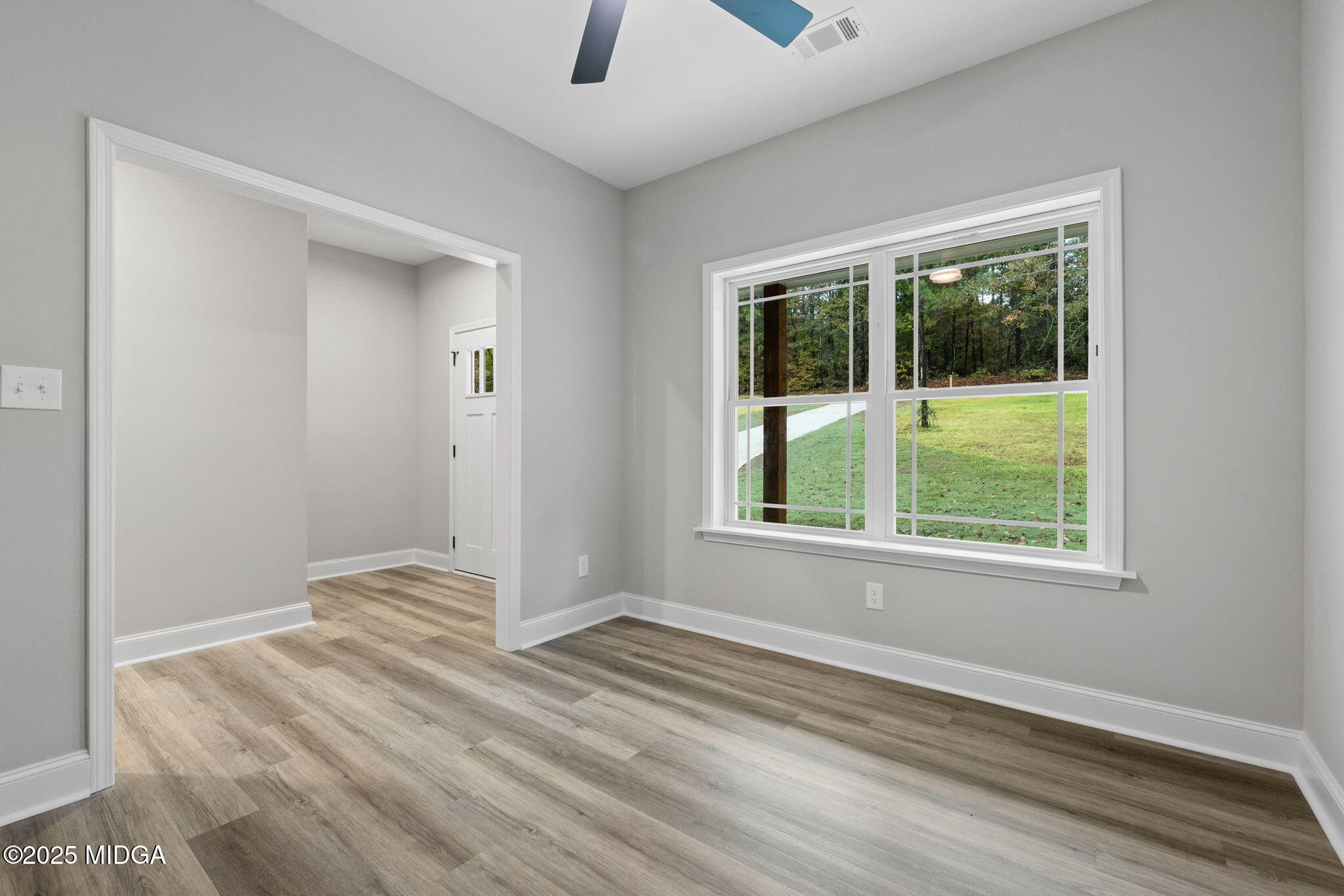 2760 Boxankle Road Forsyth, GA 31029 - Photo 6 of 50 a view of an empty room with a window