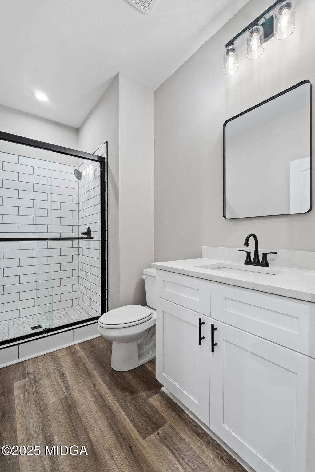 2760 Boxankle Road Forsyth, GA 31029 - Photo 8 of 50 a bathroom with a toilet sink and shower