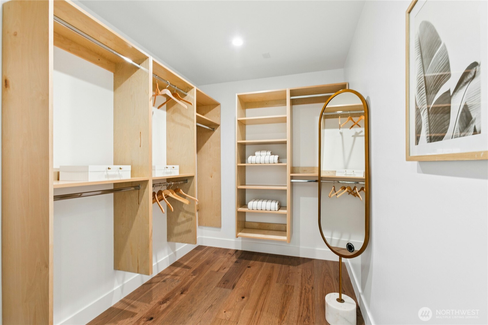 2115 Squak Mountain Loop Southwest Issaquah, WA 98027 - Photo 26 of 40 a view of a room with wooden floor and windows