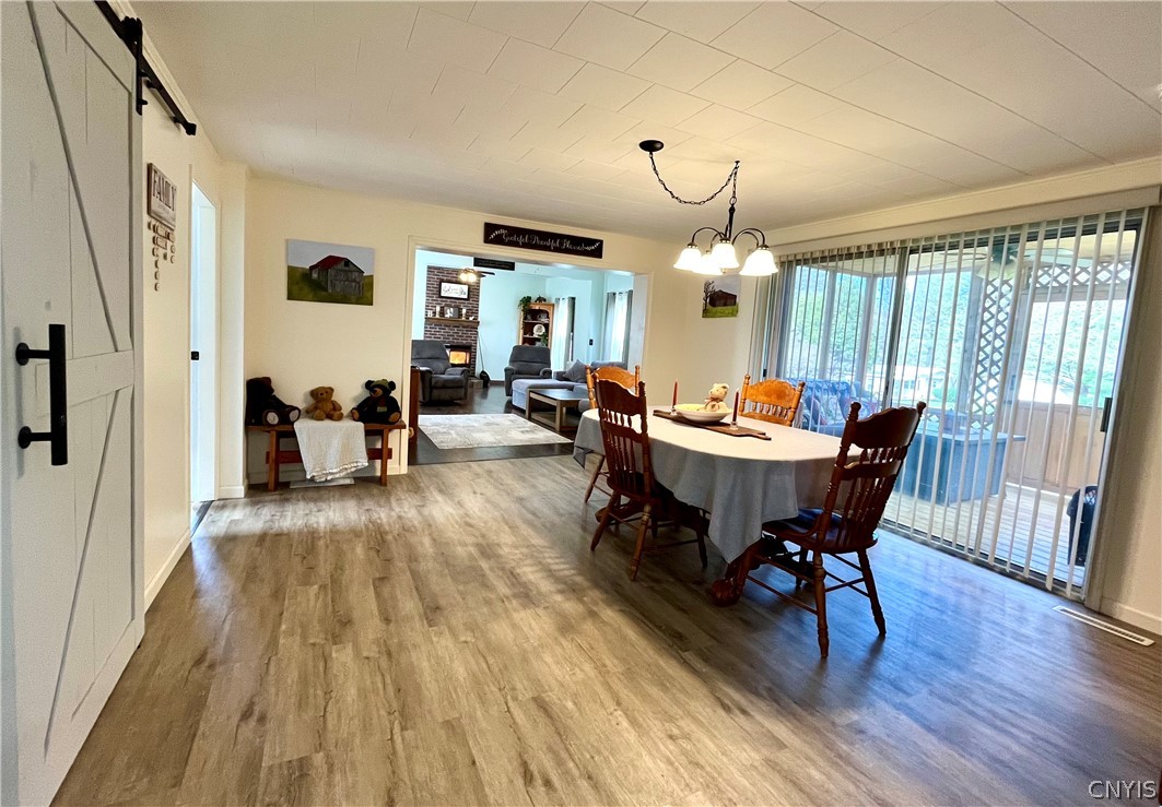 1462 Onionville Road Sterling, NY 13156 - Photo 22 of 41 Formal Dining room has sliders leading to screened
