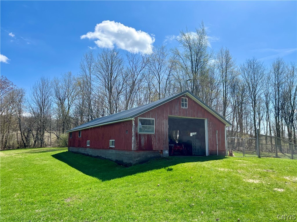 1462 Onionville Road Sterling, NY 13156 - Photo 4 of 41 Detached garage has room for your car plus a works