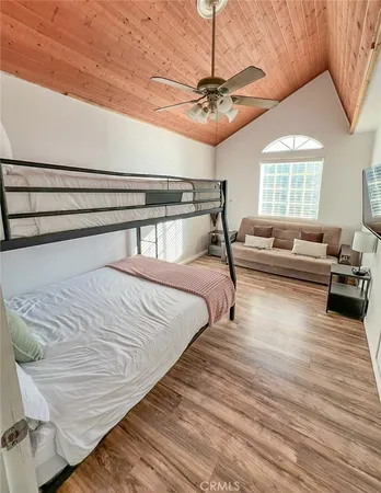 a bed room with a bed and a couch