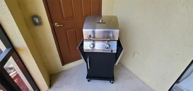a room with furniture and wooden floor