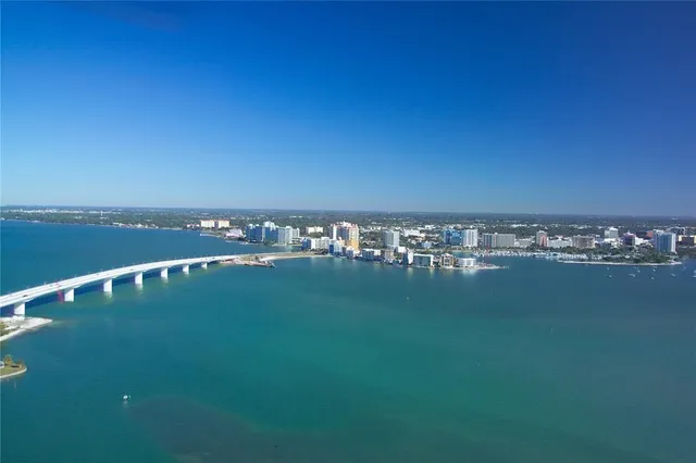 a view of a lake and a yard
