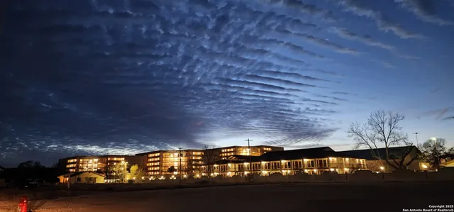 a view of room with furniture and chandelier