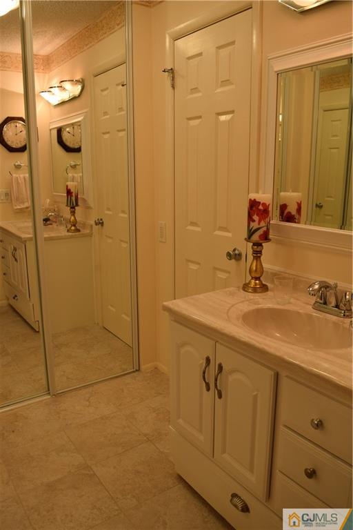 274 A Convent Road Monroe Township, NJ 08831 - Photo 8 of 12 a bathroom with a shower and a sink