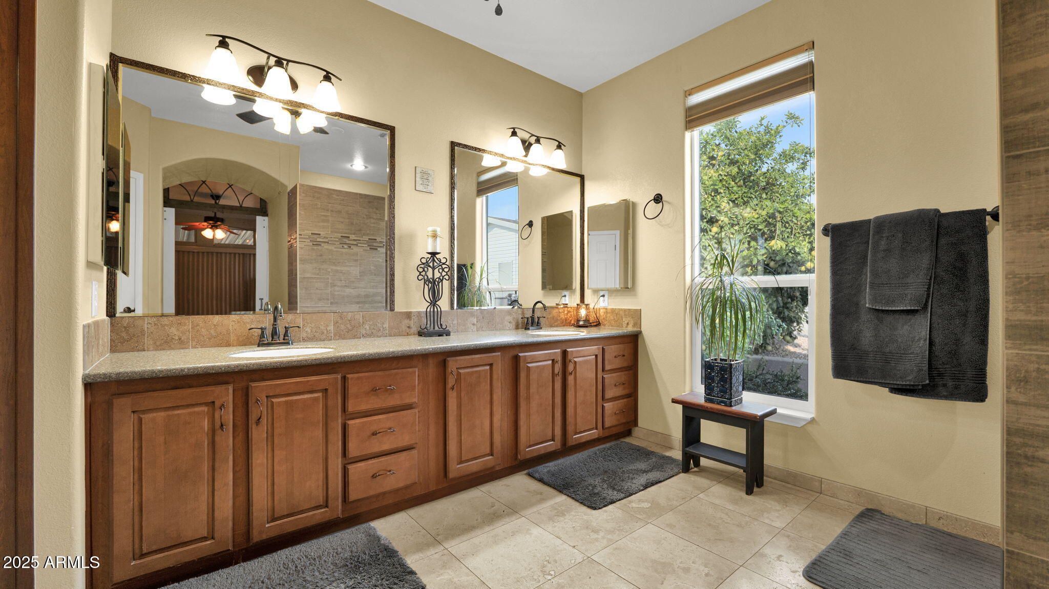3301 South Goldfield Road, Unit 6014 Apache Junction, AZ 85119 - Photo 18 of 57 a bathroom with a sink and a large mirror