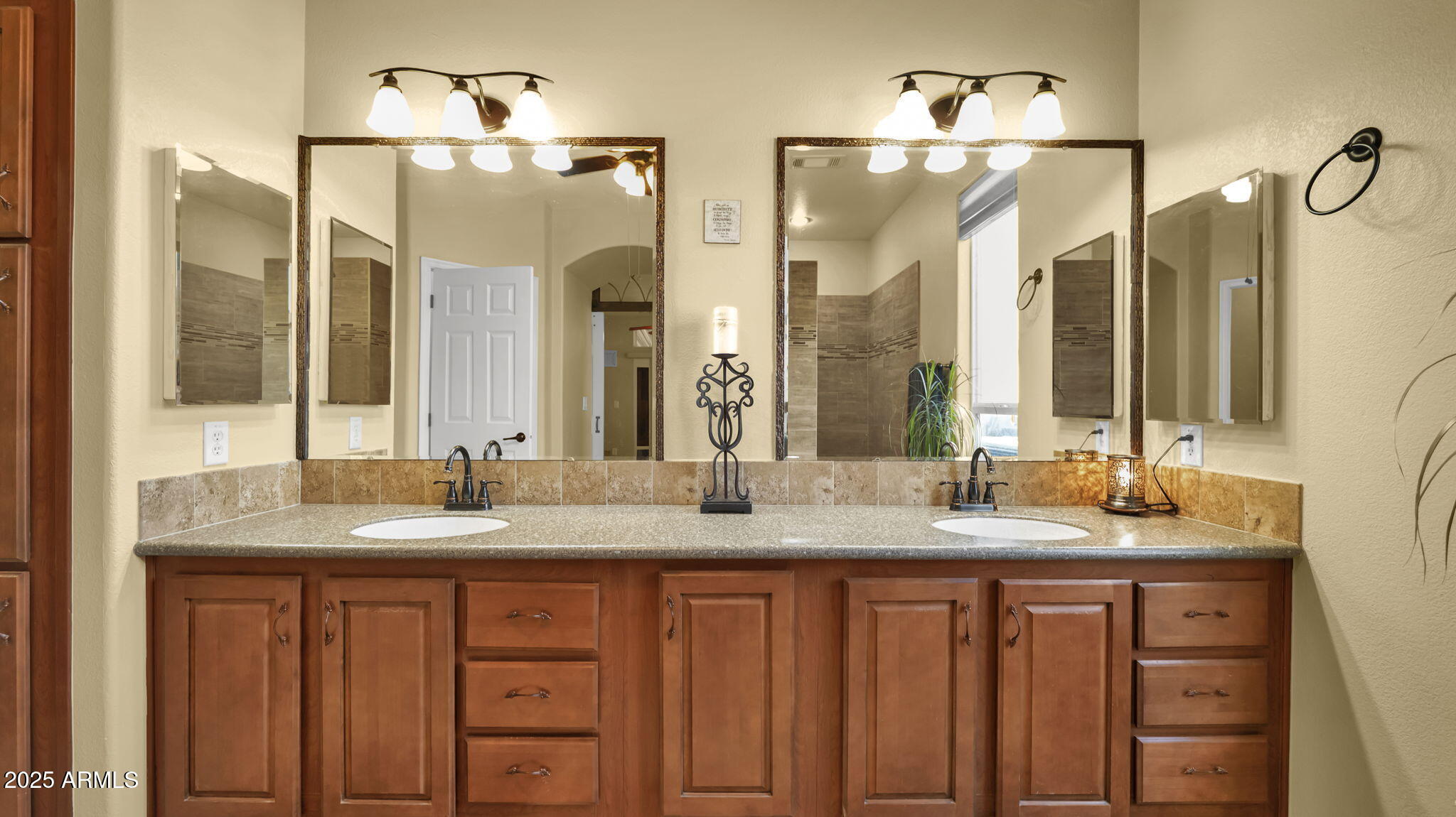 3301 South Goldfield Road, Unit 6014 Apache Junction, AZ 85119 - Photo 19 of 57 a bathroom with a granite countertop sink and a mirror