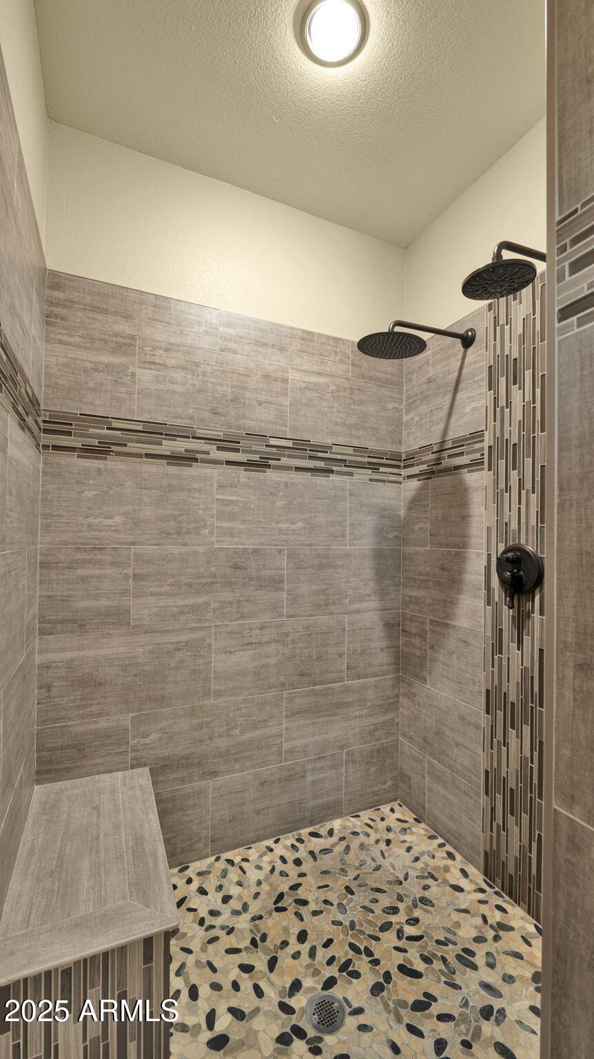3301 South Goldfield Road, Unit 6014 Apache Junction, AZ 85119 - Photo 20 of 57 a bathroom with a shower