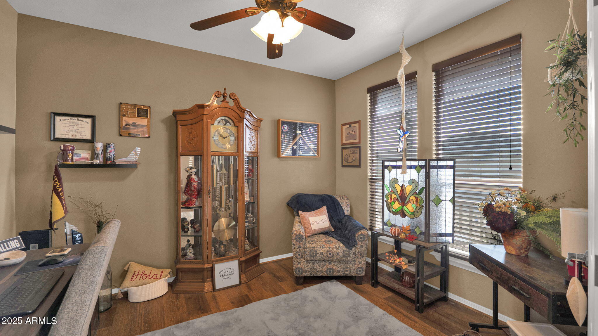 3301 South Goldfield Road, Unit 6014 Apache Junction, AZ 85119 - Photo 26 of 57 a living room with furniture and a flat screen tv