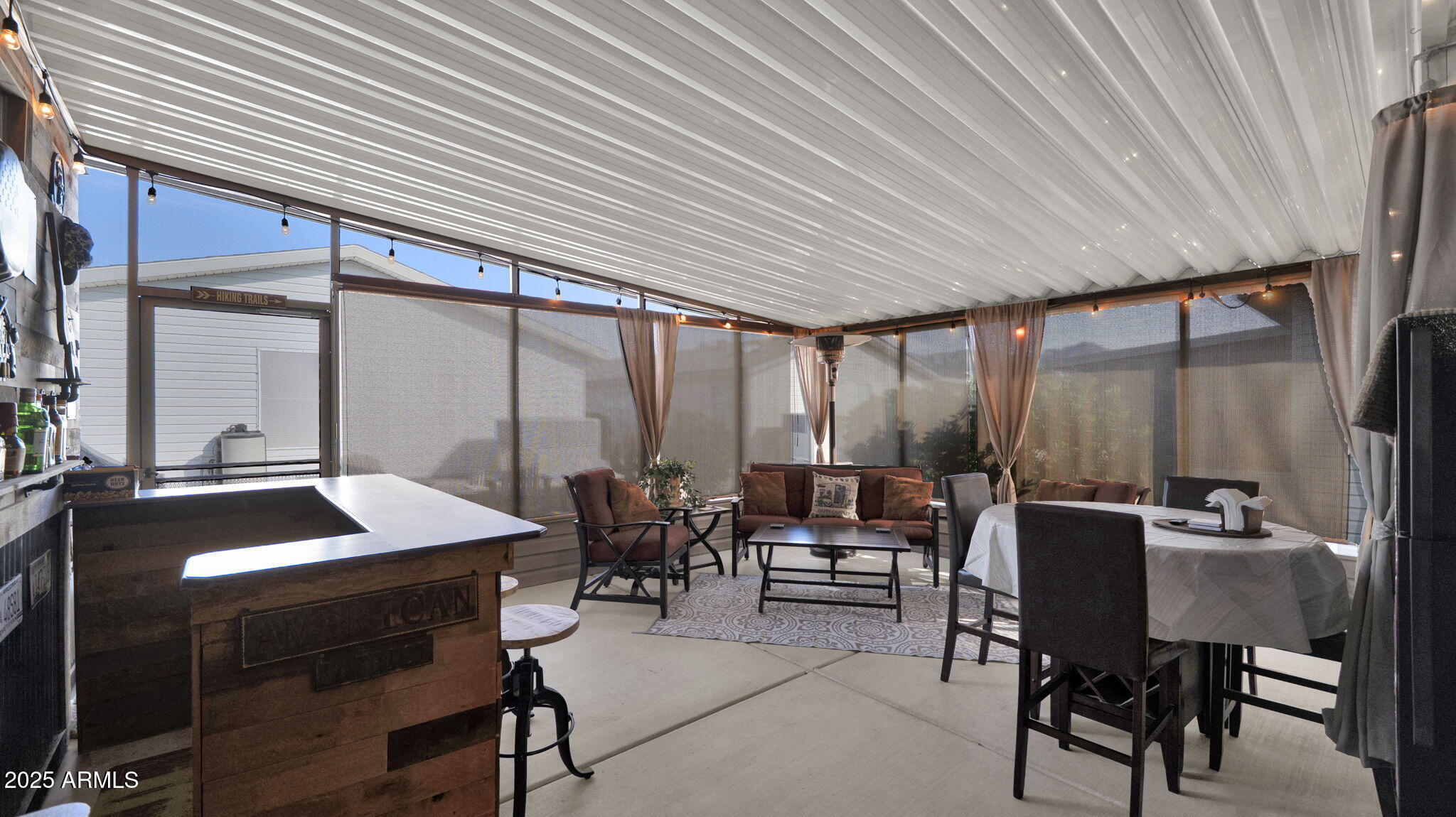 3301 South Goldfield Road, Unit 6014 Apache Junction, AZ 85119 - Photo 31 of 57 a outdoor dining space with furniture and outdoor view