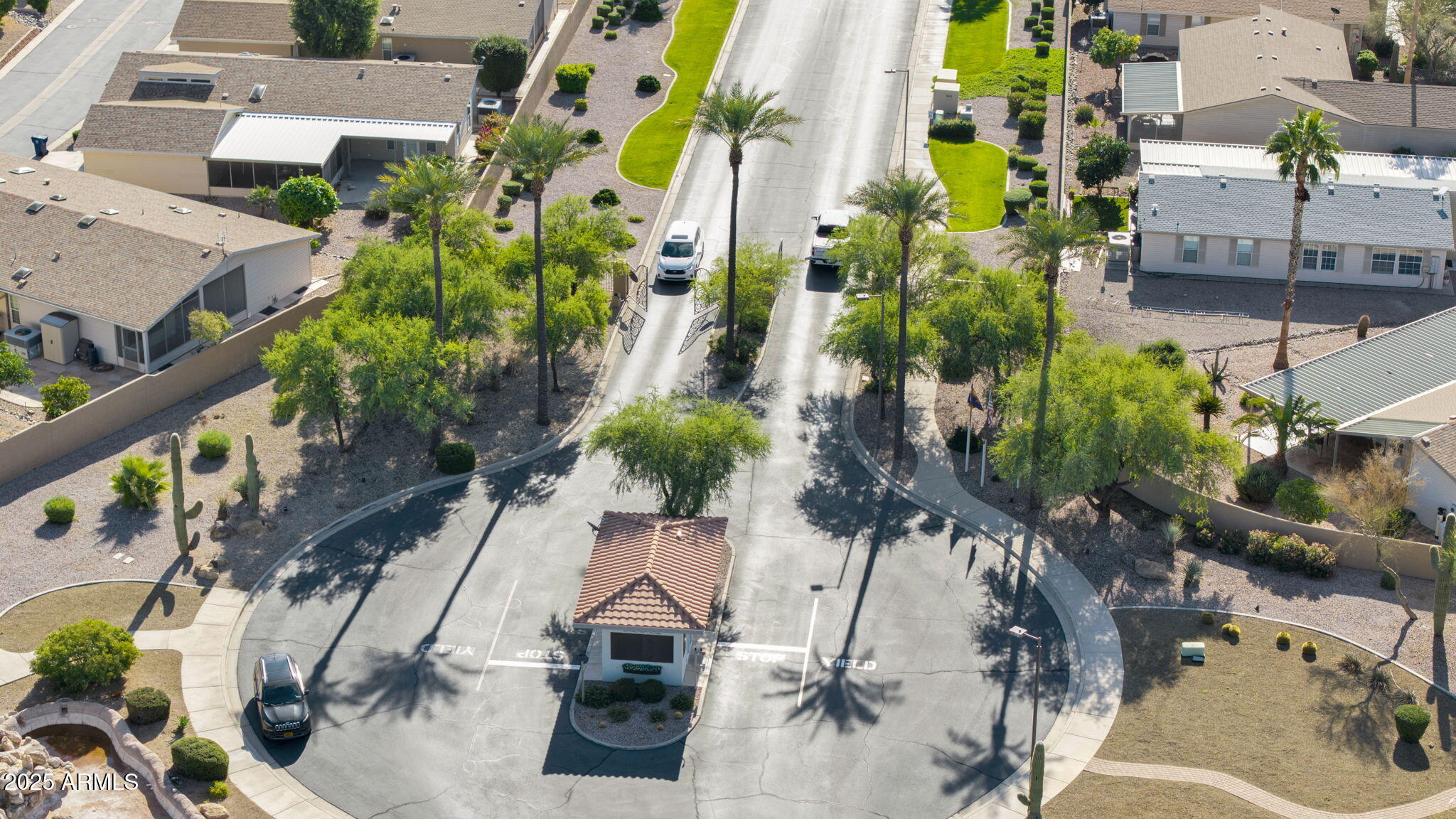 3301 South Goldfield Road, Unit 6014 Apache Junction, AZ 85119 - Photo 43 of 57 an aerial view of residential houses with outdoor space