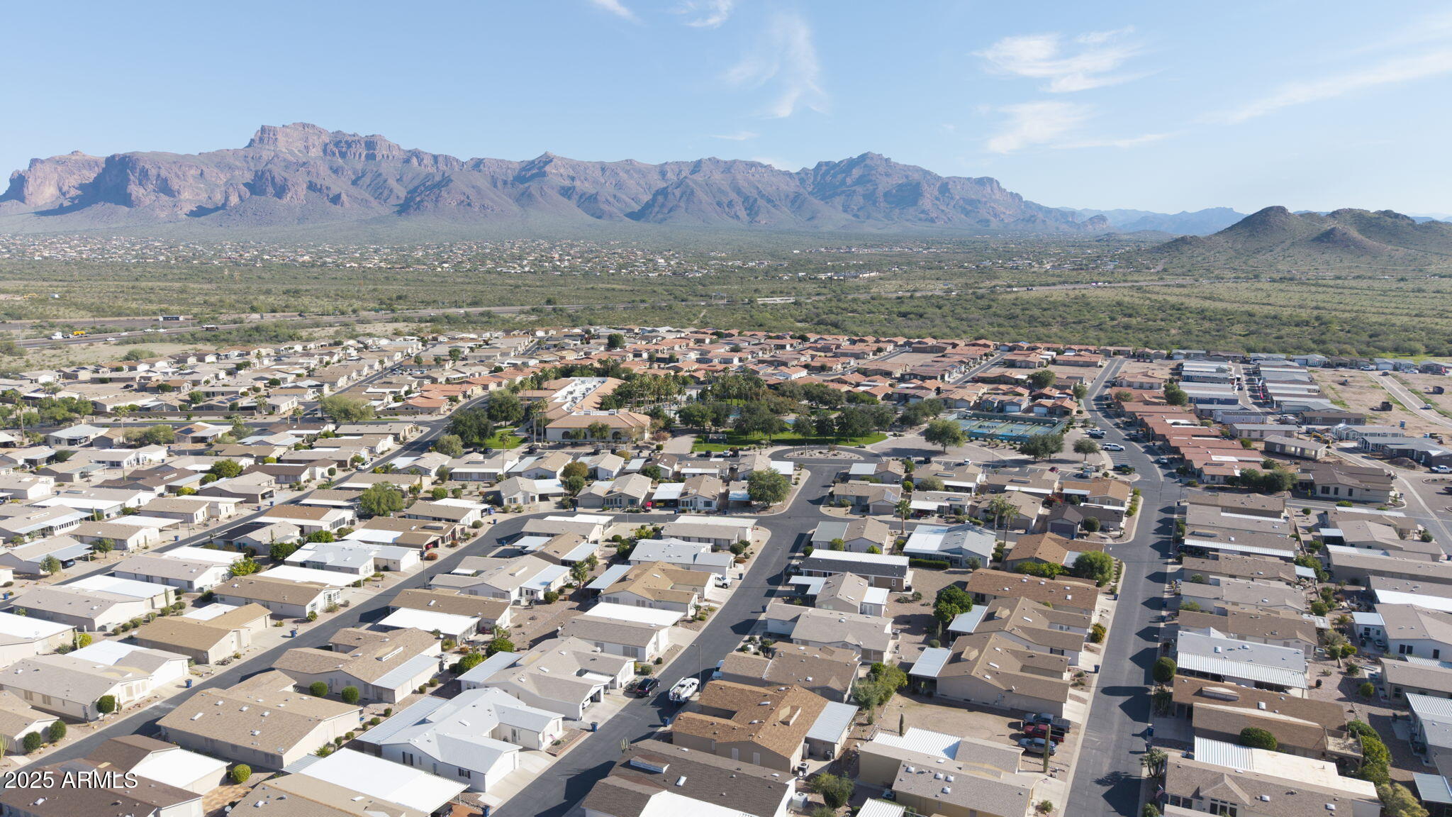 3301 South Goldfield Road, Unit 6014 Apache Junction, AZ 85119 - Photo 55 of 57 an aerial view of residential house with an ocean and mountain view