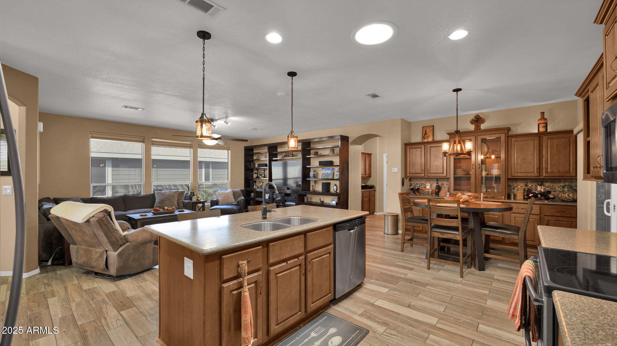 3301 South Goldfield Road, Unit 6014 Apache Junction, AZ 85119 - Photo 5 of 57 a large kitchen with kitchen island a large island in it