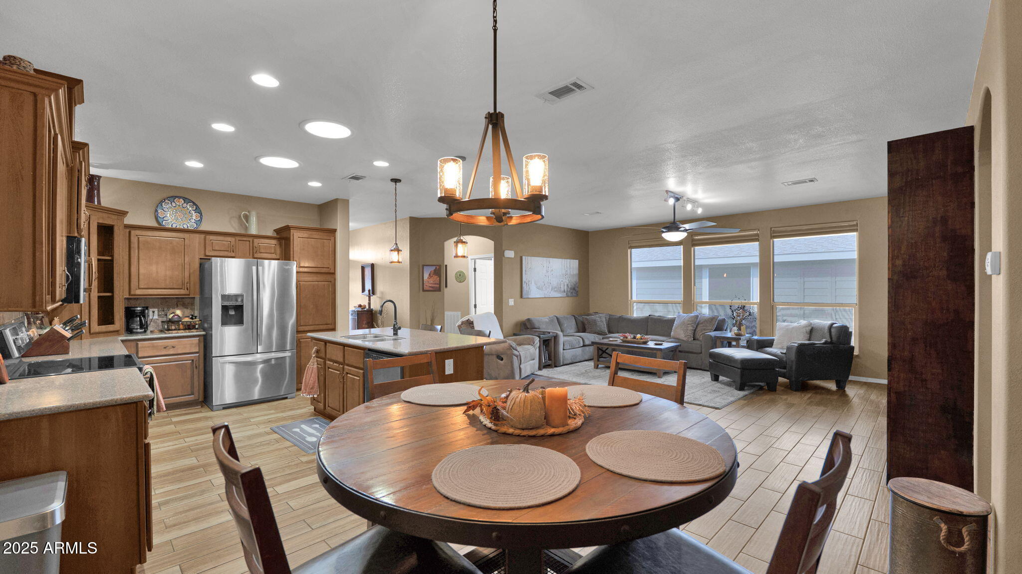 3301 South Goldfield Road, Unit 6014 Apache Junction, AZ 85119 - Photo 8 of 57 a large kitchen with a table and chairs