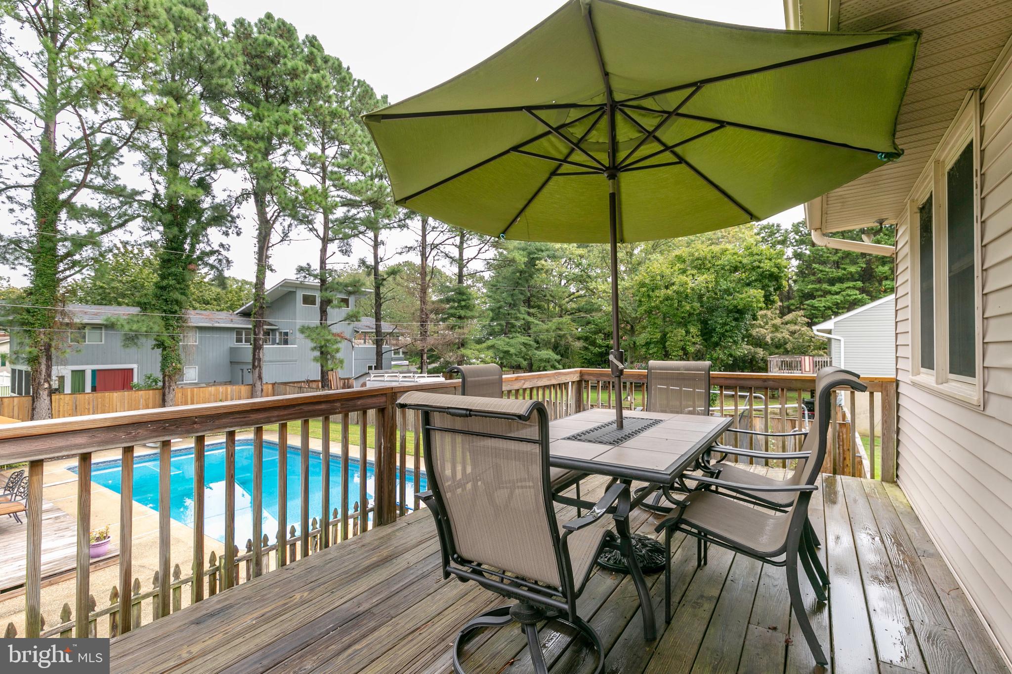 105 Rutledge Road Queenstown, MD 21658 - Photo 15 of 57 Deck overlooking the pool