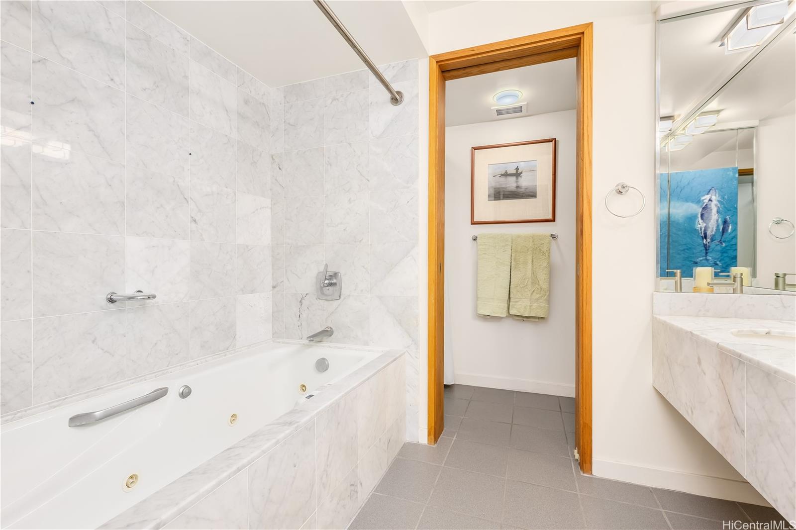 1330 Ala Moana Boulevard, Unit 1308 Honolulu, HI 96814 - Photo 17 of 24 a bathroom with a bathtub and a sink