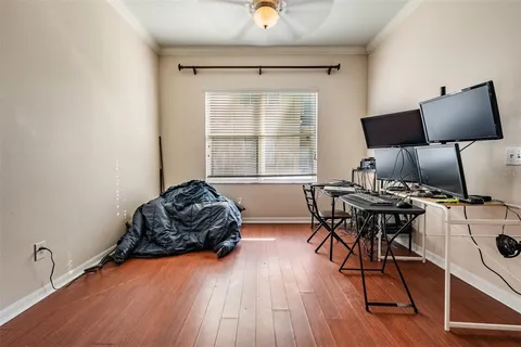 a bedroom with furniture and a window