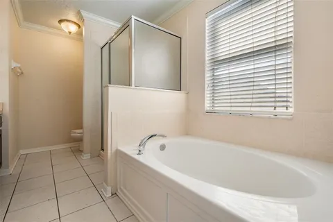 a room with furniture and wooden floor