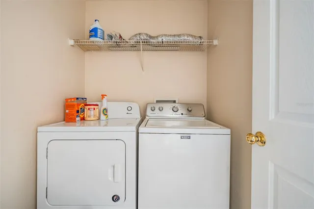 a bathroom with a sink a mirror and vanity