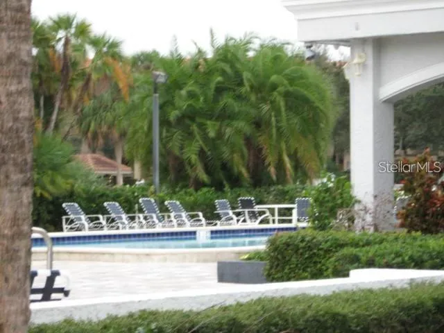 a front view of house with a garden