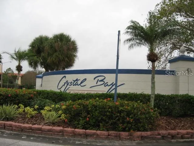 a front view of a building with a yard