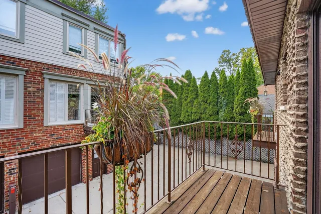 a view of a house with a flower garden