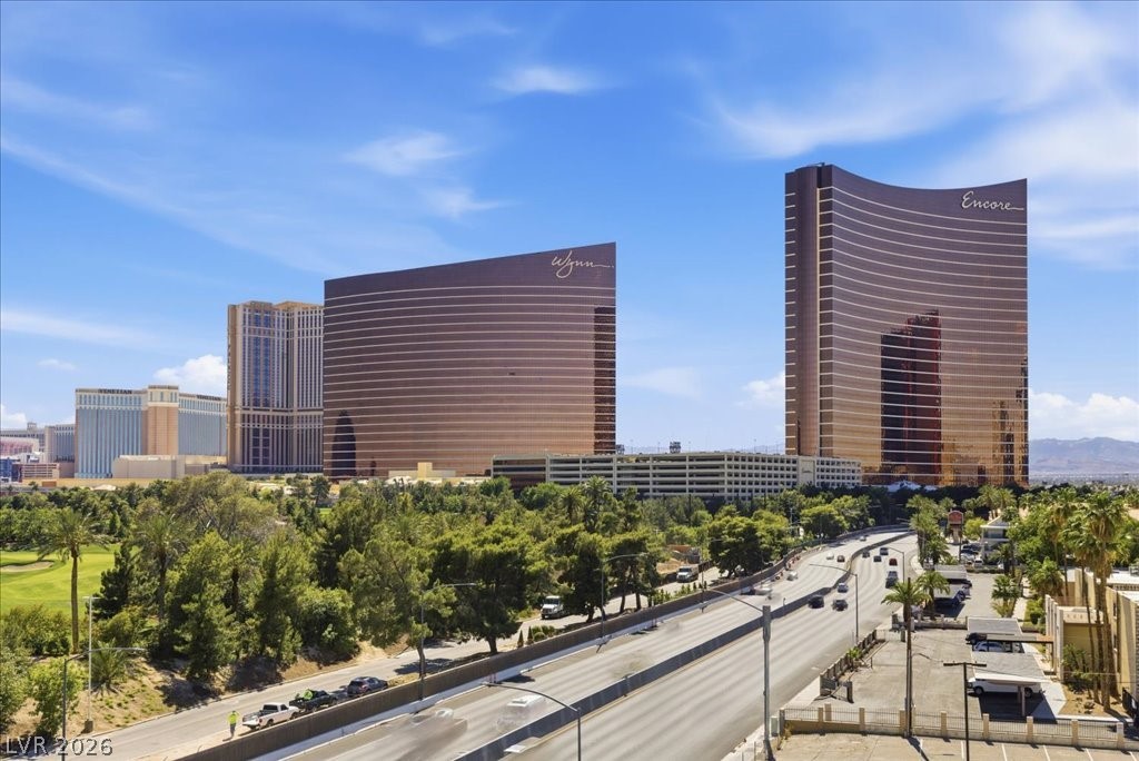 360 East Desert Inn Road, Unit 604 Las Vegas, NV 89109 - Photo 3 of 28 High-rise towers offer city views over a verdant golf course and bustling highway.