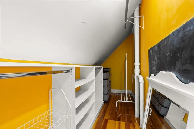 a view of a balcony with wooden floor