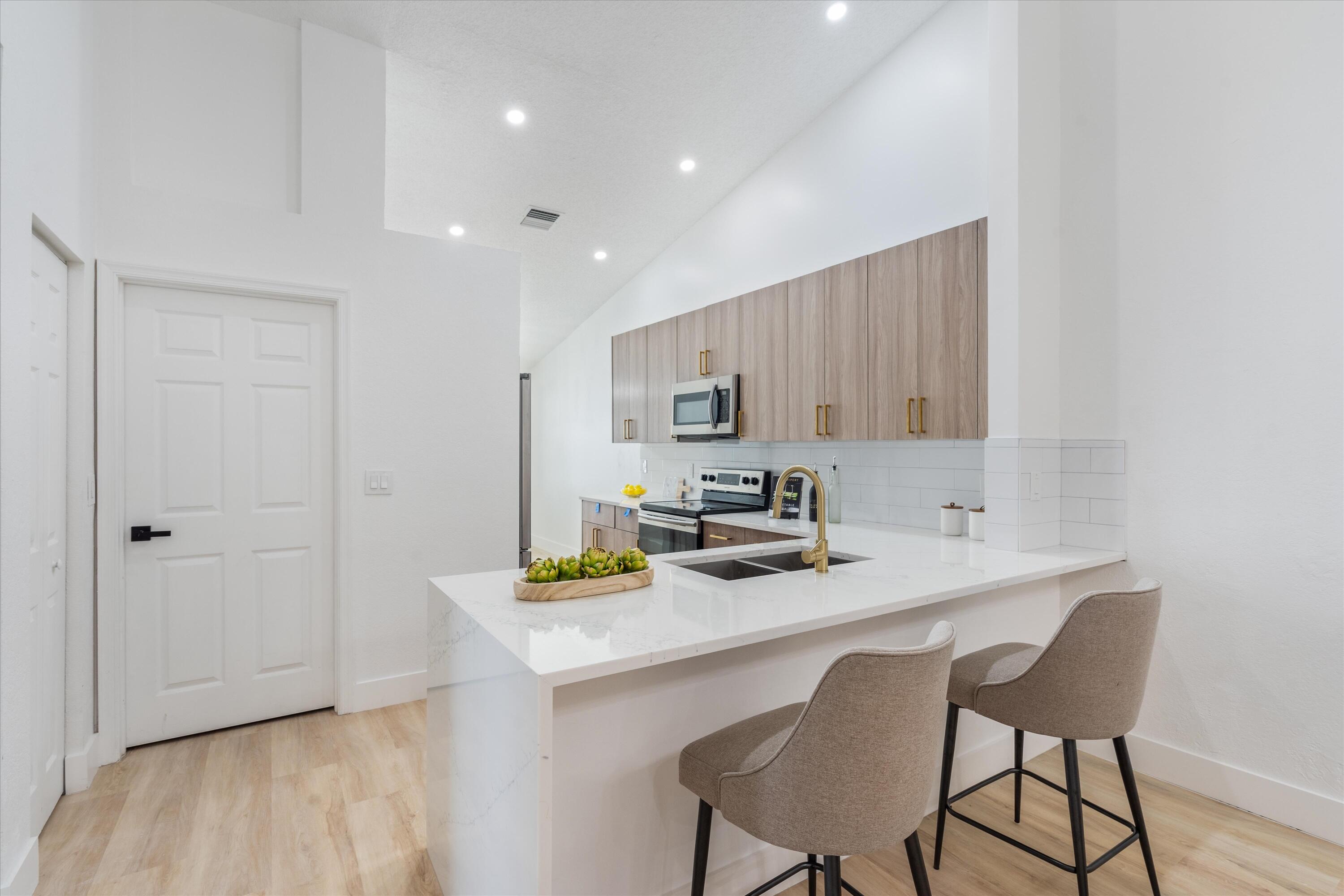 6092 Caladium Road Delray Beach, FL 33484 - Photo 8 of 59 eat in kitchen