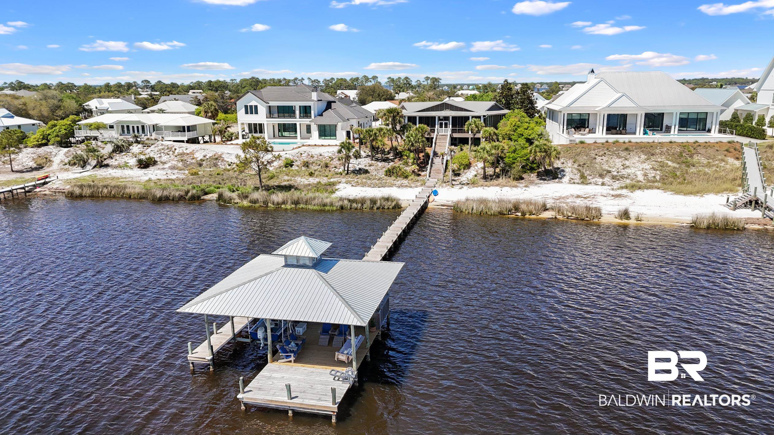 31304 River Road Orange Beach, AL 36561 - Photo 64 of 78 View of dock with a water view and a residential view