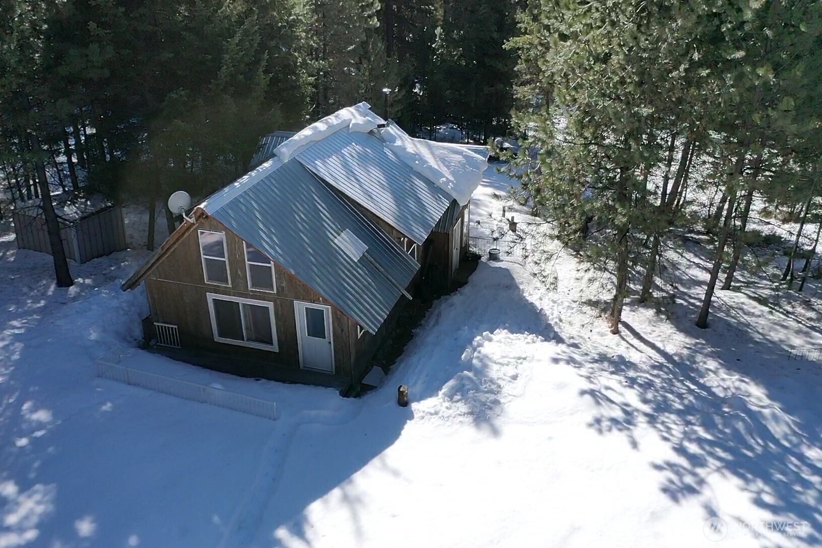 65A Spring Meadow Lane Oroville, WA 98844 - Photo 24 of 40 a view of a house with a yard