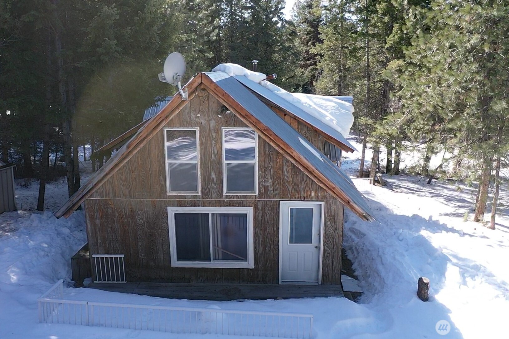 65A Spring Meadow Lane Oroville, WA 98844 - Photo 36 of 40 a house view with a outdoor space
