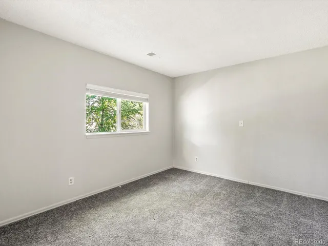 a view of hallway with closet