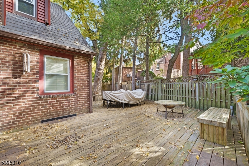 654 Suffern Road Teaneck, NJ 07666 - Photo 29 of 30 a view of a patio with a table and chairs and couches