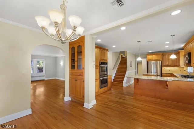 a view of a livingroom with wooden floor