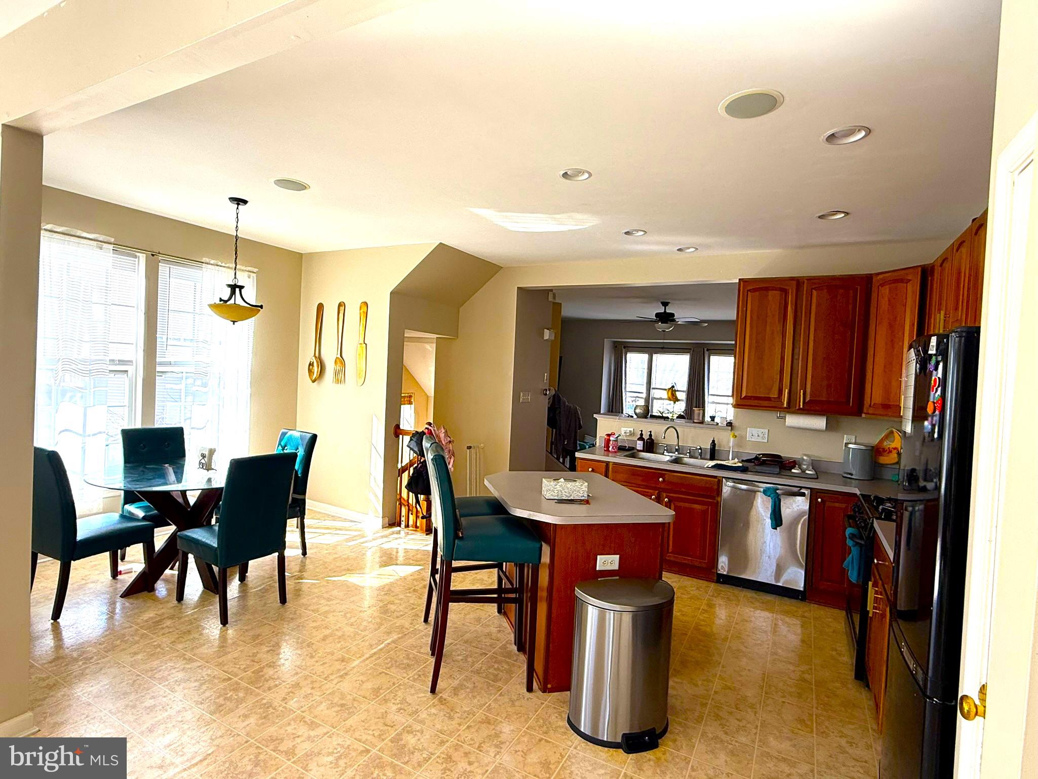 80 Colts Neck Drive Sicklerville, NJ 08081 - Photo 13 of 14 a large kitchen with a table and chairs
