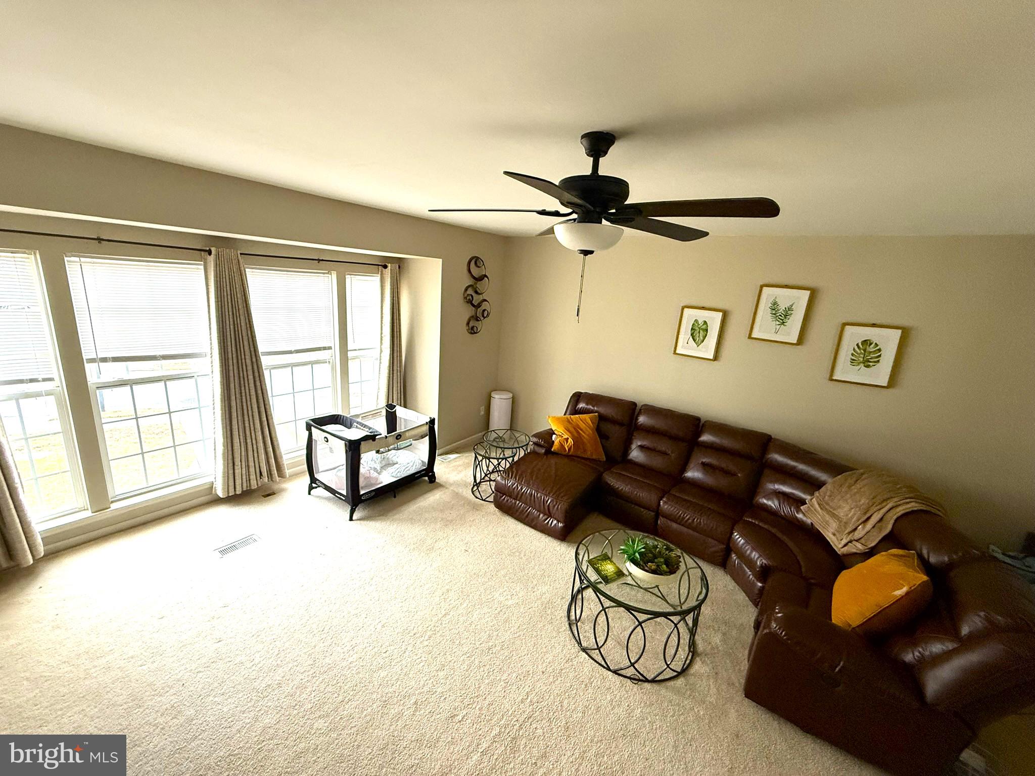 80 Colts Neck Drive Sicklerville, NJ 08081 - Photo 5 of 14 a living room with furniture and a large window