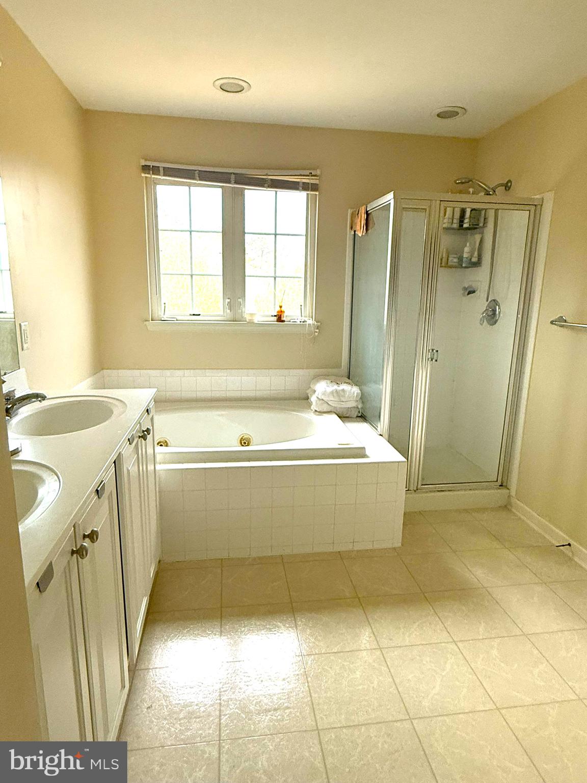 80 Colts Neck Drive Sicklerville, NJ 08081 - Photo 7 of 14 a spacious bathroom with a tub sink and mirror