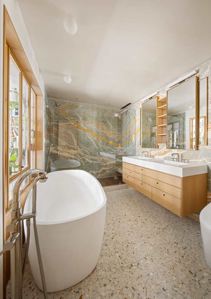 50 Wooster Street, Unit 4NR Manhattan, NY 10013 - Photo 11 of 16 a bathroom with a tub sink and mirror