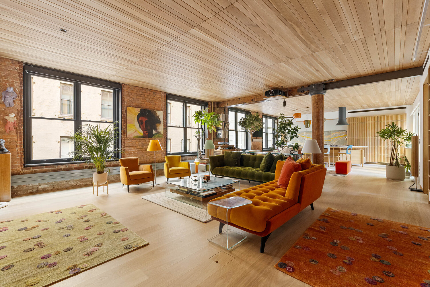 50 Wooster Street, Unit 4NR Manhattan, NY 10013 - Photo 2 of 16 a living room with furniture and a large window
